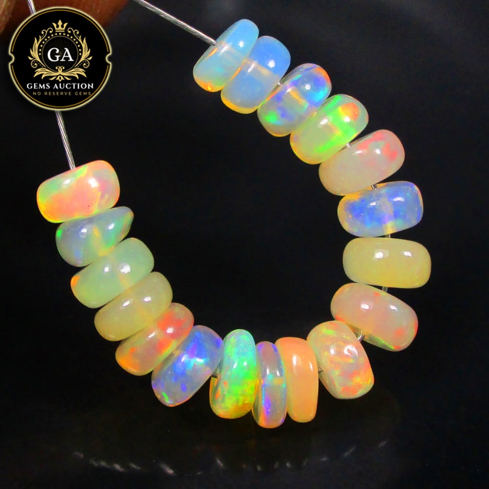 5.44 Ct Natural Drilled Multi-color Opal Good Fire Round Beads: Weight - 5.44 Ct / Size - 4.60 - 5.20 mm / 18 Pc's / Shape -Round Beads / Color - Multicolor / Clarity - Transparent / Origin - Ethiopia / Treatment - None