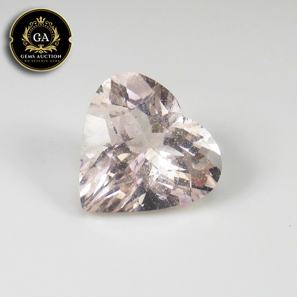 5.38 Ct Natural Peach Pink Morganite Heart Cut: Weight - 5.38 Ct / Size - 12.70 x 12.00 x 7.50 mm / Shape - Heart Cut / Color - Light Pink / Clarity - VVS / Origin - Mozambique / Treatment - None
