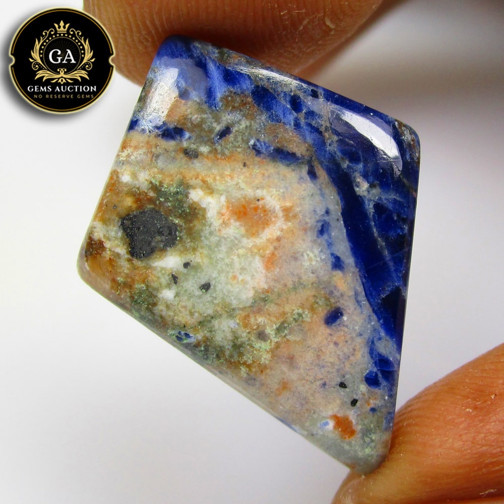 12.33 Ct Natural Sodolite Fancy Cab: Weight - 12.33 Ct / Size - 25.00 x 18.40 x 4.60 mm / Shape - Fancy Cab / Clarity - Opaque / Origin - Russia / Treatment - None