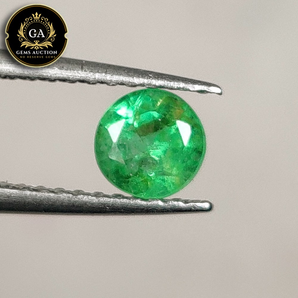 0.51 Ct Natural Zambian Green Emerald Round Cut: Weight - 0.51 Ct / Size - 4.80 x 4.80 x 3.80 mm / Shape - Round Cut / Color - Green / Clarity - SI / Origin - Zambia / Treatment - Colorless Oil