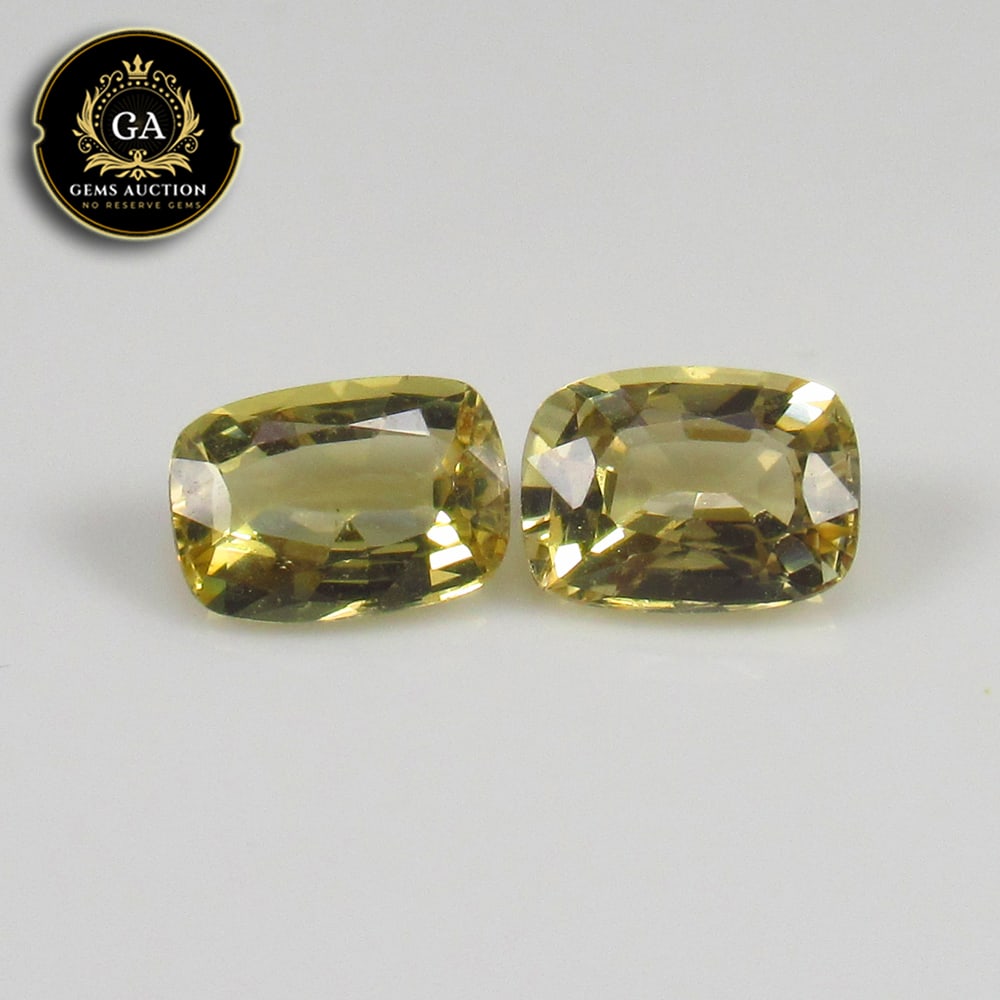 1.60 Ct Natural Yellow Beryl Cushion Cut Pair: Weight - 1.60 Ct / Size - 6.90 x 4.90 x 3.20 mm / 2 Pc's / Shape - Cushion Cut / Clarity - Transparent / Origin - Brazil / Treatment - None