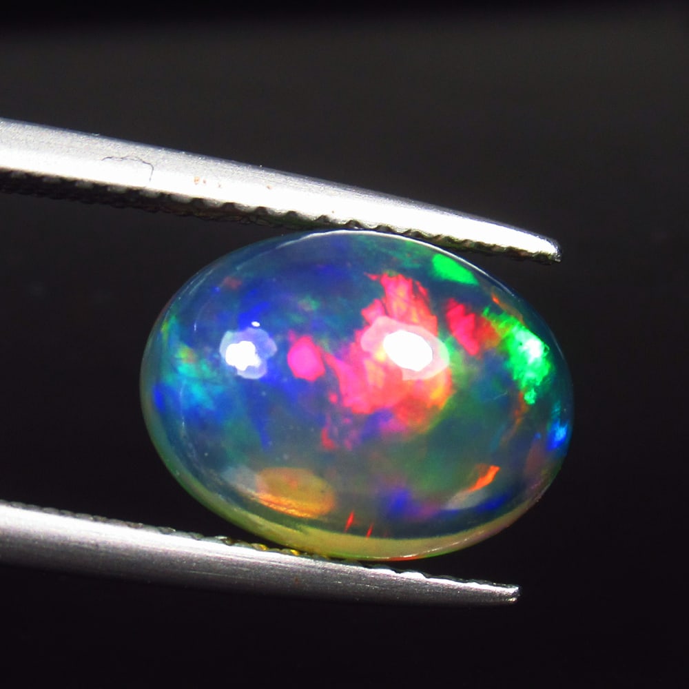3.50 Ct Natural Black Top Flash Fire Opal Oval Cab (1 of 3)
