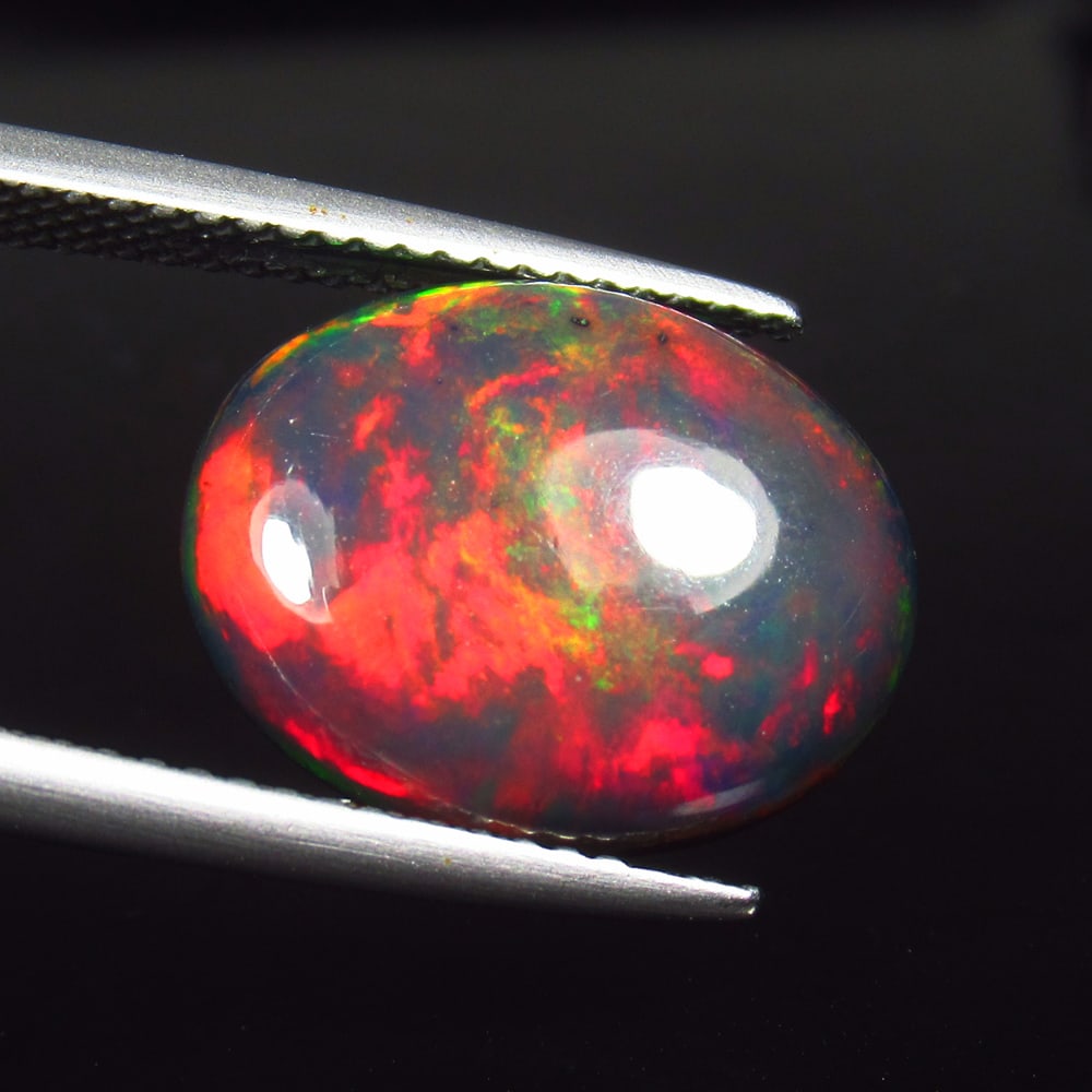 3.96 Ct Natural Black Flash Fire Opal Oval Cab (1 of 3)