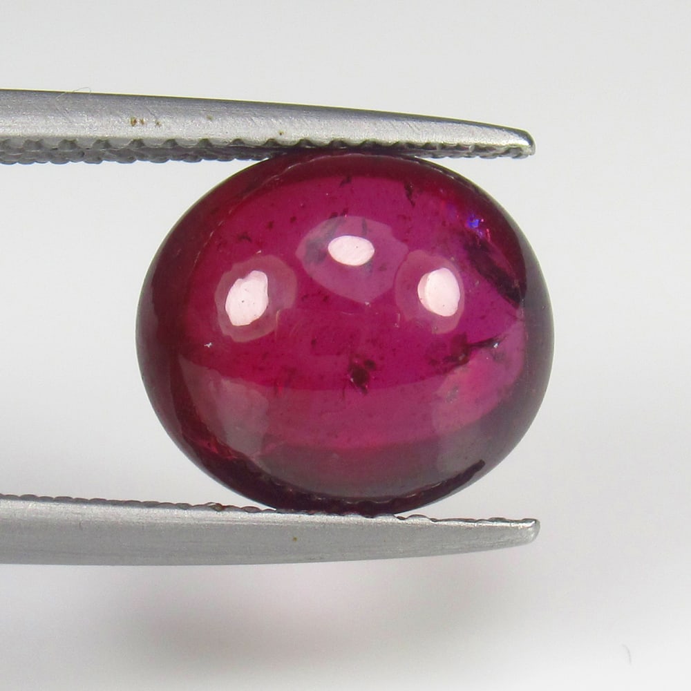 5.65 Ct Natural Rhodolite Garnet "Almandine Red" Oval Cab: Weight - 5.65 Ct / Size - 10.70 x 9.60 x 5.50 mm / Shape - Oval Cab / Clarity - Transparent / Origin - Nigeria / Treatment - None