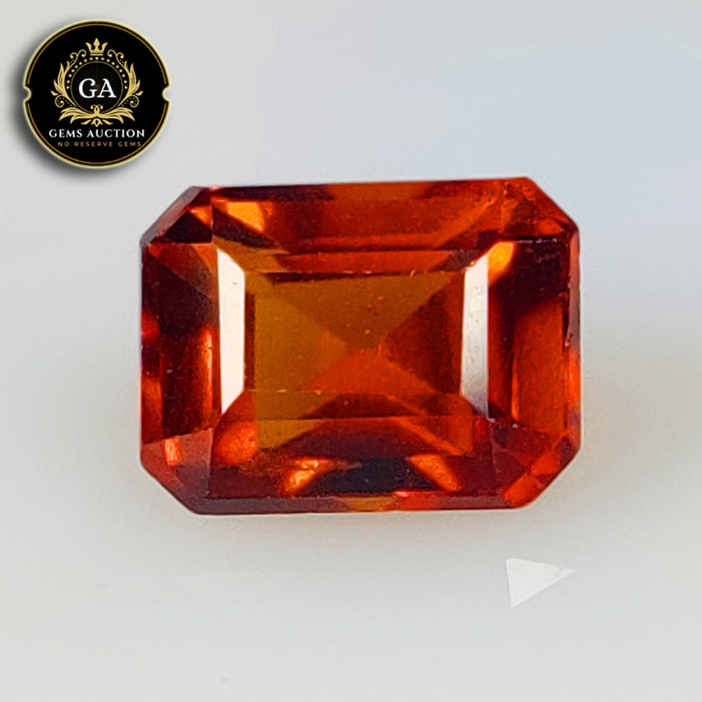 3.48 Ct Natural Deep Orange Hessonite Garnet Emerald Cut (1 of 3)