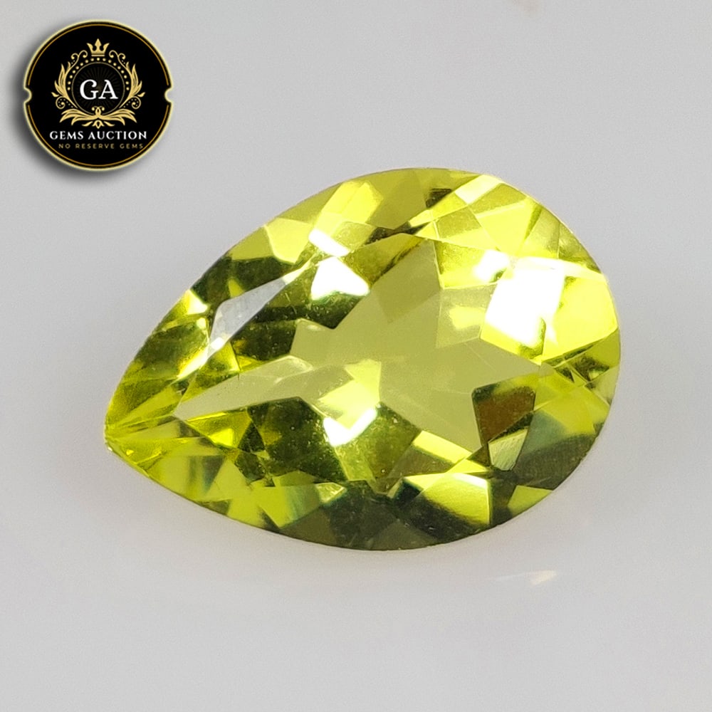 4.18 Ct Natural Lemon Quartz Pear Cut: Weight - 4.18 Ct / Size - 13.90 x 9.90 x 6.30 mm / Shape - Pear Cut / Clarity - VVS / Origin - Brazil / Treatment - None