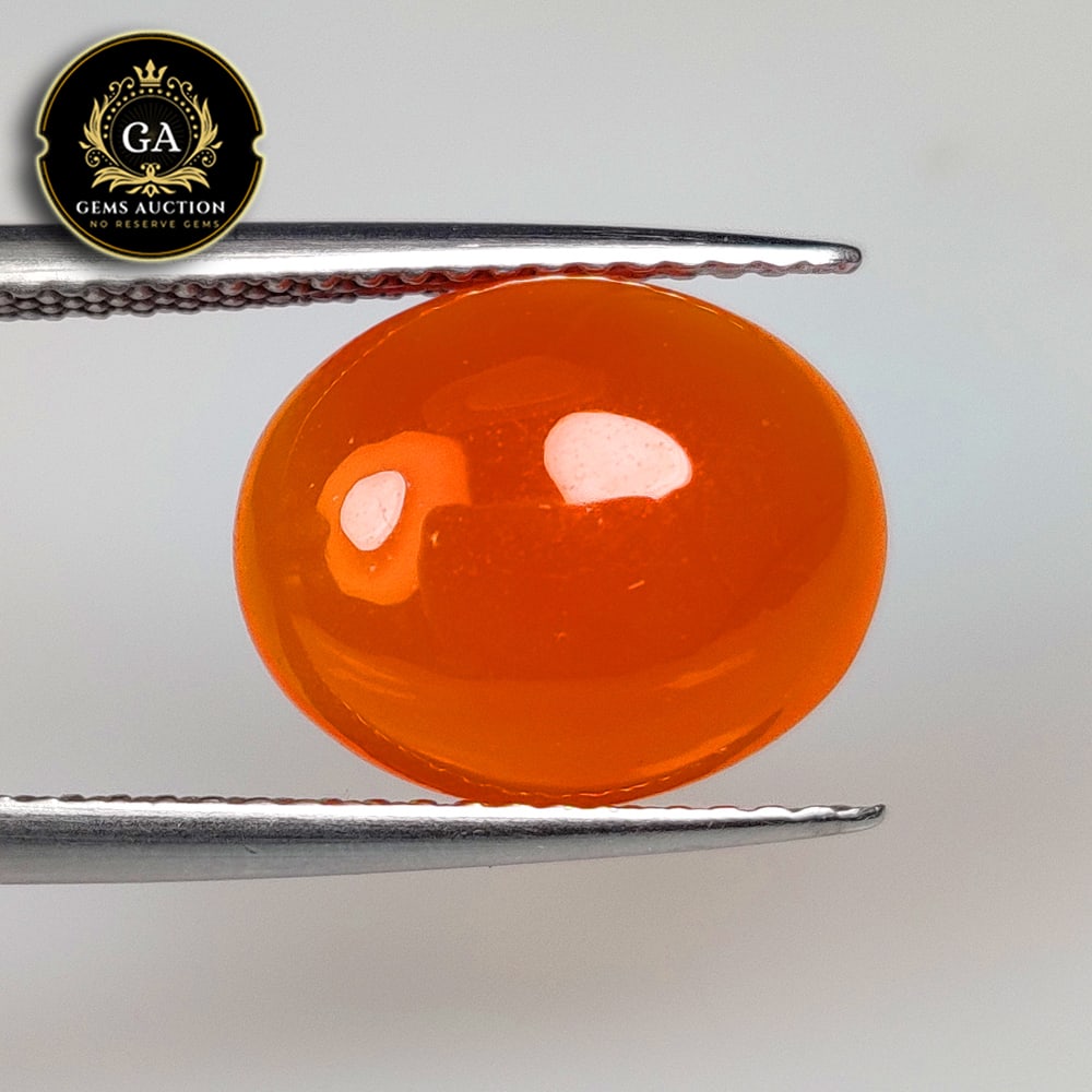 4.10 Ct Natural Orange Carnelian Oval Cab: Weight - 4.10 Ct / Size - 12.20 x 10.00 x 4.70 mm / Shape - Oval Cab / Clarity - Semi - Transparent / Origin - Brazil