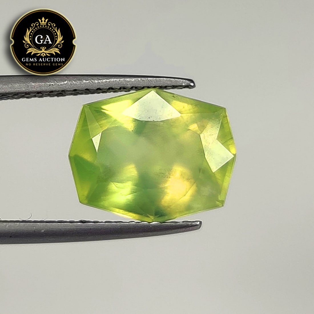 4.54 Ct Natural Fine Green Prehnite Fancy Cushion Cut: Weight - 4.54 Ct / Size - 12.00 x 9.80 x 6.20 mm / Shape - Fancy Cushion Cut / Clarity - Semi Transaprent / Origin - Brazil / Treatment - None