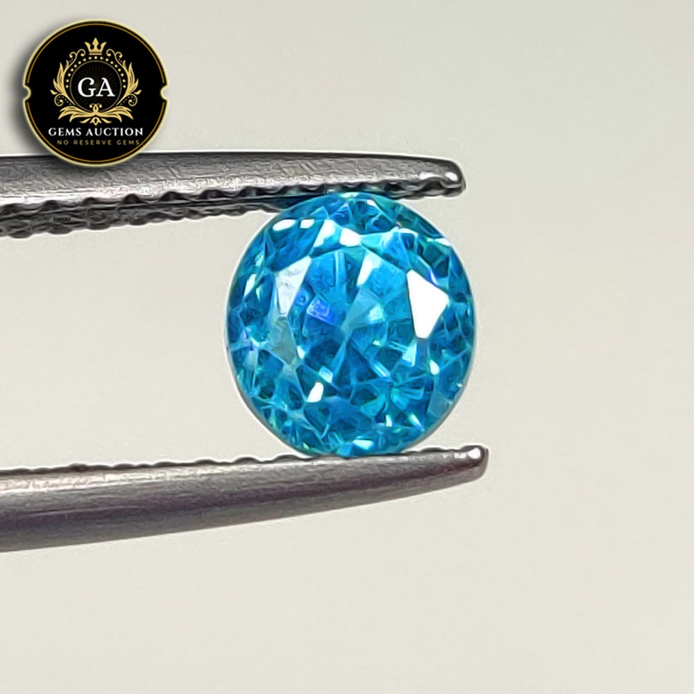 1.65 Ct Natural Blue Zircon Round Cut: Weight - 1.65 Ct / Size - 5.50 x 5.50 x 5.00 mm / Shape - Round Cut / Color - Blue / Clarity - VVS / Origin - Cambodia / Treatment - Gentle Heat