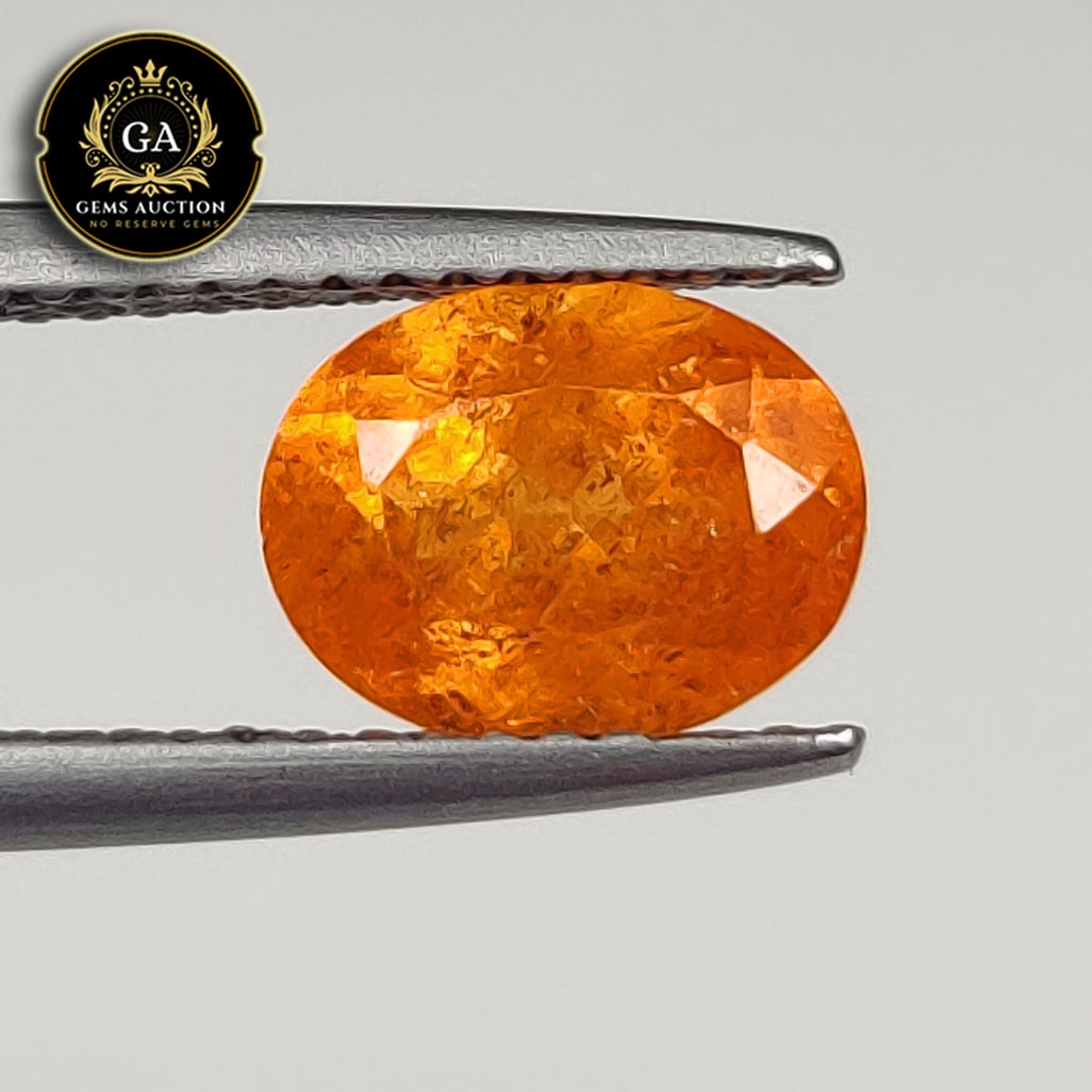 2.16 Ct Natural Fanta Orange Spessarite Garnet Oval Cut: Weight - 2.16 Ct / Size - 8.50 x 6.50 x 4.50 mm / Shape - Oval Cut / Clarity - SI / Origin - Madagascar / Treatment - None