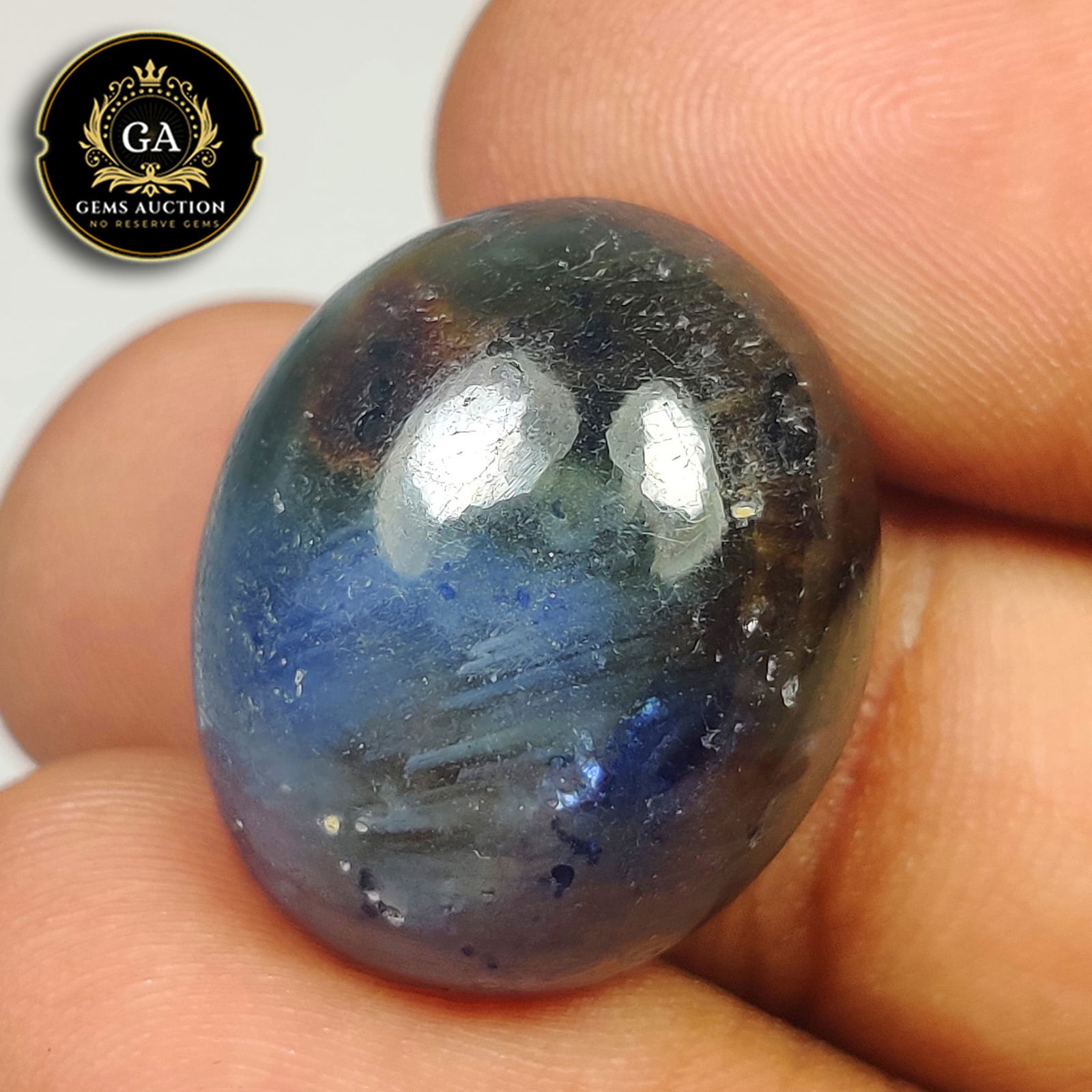 45.04 Ct Natural Blue Shaded Labradorite Oval Cab: Weight - 45.04 Ct / Size - 20.50 x 18.00 x 11.00 mm / Shape - Excellent Oval Cabochon / Clarity - Opaque / Origin - Africa / Treatment - None
