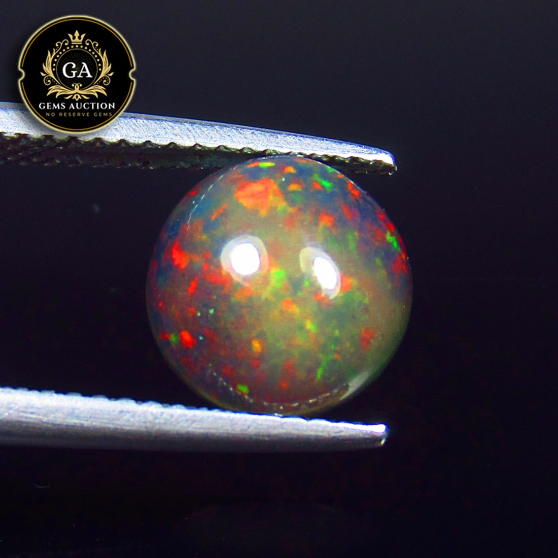 1.81 Ct Natural Black Flash Fire Opal Round Cab (1 of 3)