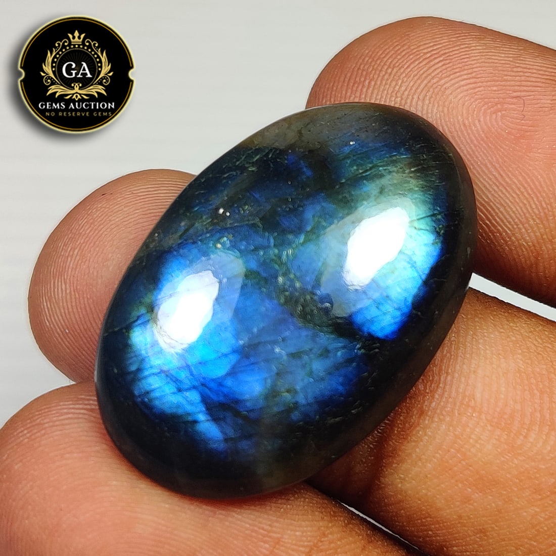 32.40 Ct Natural Blue Shaded Labradorite Oval Cab: Weight - 32.40 Ct / Size - 30.00 x 19.50 x 7.50 mm / Shape - Excellent Oval Cabochon / Clarity - Opaque / Origin - Africa / Treatment - None
