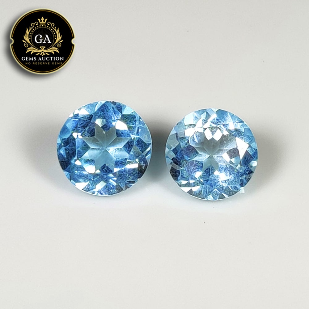 7.63 Ct Natural Blue Topaz Round Cut Pair: Weight - 7.63 Ct / Size - 9.40 x 9.40 x 6.00 mm / 2 Pc's / Shape - Round Cut / Color - Blue / Clarity - VVS / Origin - Brazil / Treatment - Irradiated