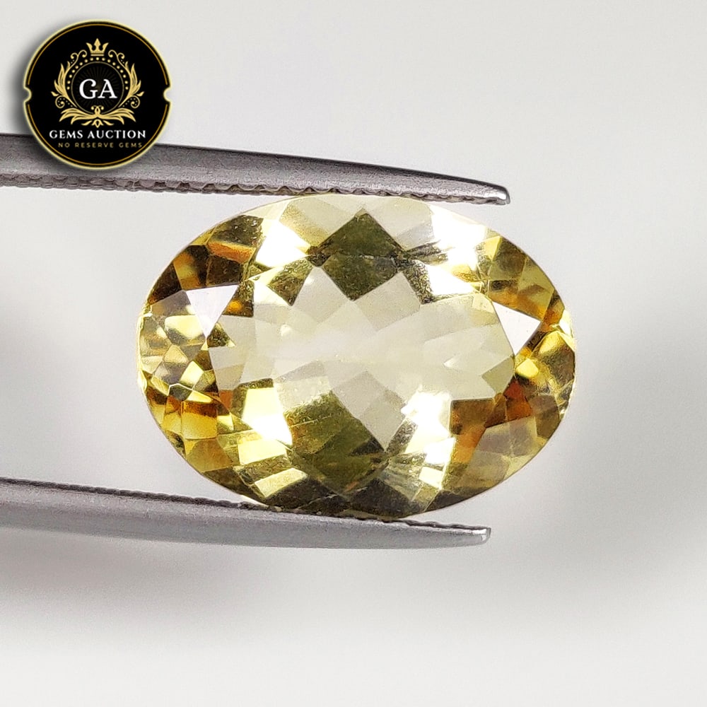 6.50 Ct Natural Yellow Citrine Oval Cut: Weight - 6.50 Ct / Size - 15.30 x 11.60 x 6.70 mm / Shape - Oval Cut / Color - Yellow / Clarity - VVS / Origin - Brazil / Treatment - None