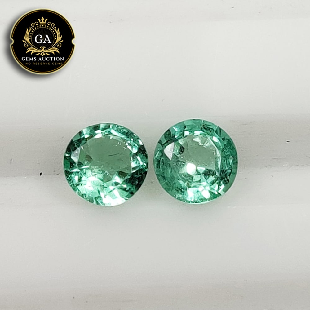 0.74 Ct Natural Zambian  Emerald Round Cut Pair (1 of 3)