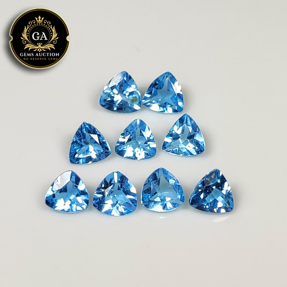 4.20 Ct Natural Blue Topaz Trillion Cut Necklace Set: Weight - 4.20 Ct / Size -4.8x2.8 - 5.2x3.4 mm / 9 Pc's / Shape - Trillion Cut / Color - Blue / Clarity - VVS / Origin - Brazil / Treatment - Irradiated