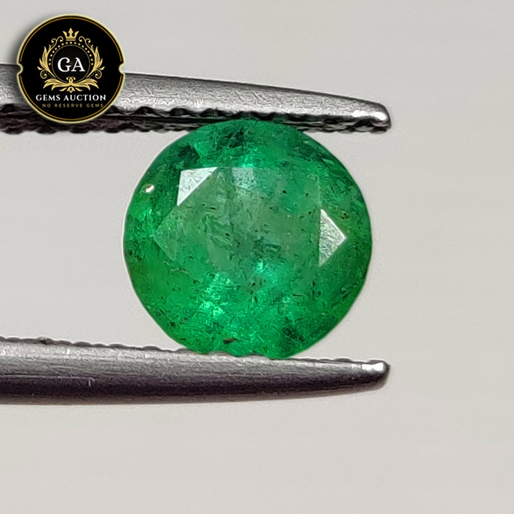 0.93 Ct Natural Zambian Green Emerald Round Cut: Weight - 0.93 Ct / Size - 6.20 x 6.20 x 4.20 mm / Shape - Round Cut / Color - Green / Clarity - SI / Origin - Zambia / Treatment - Colorless Oil