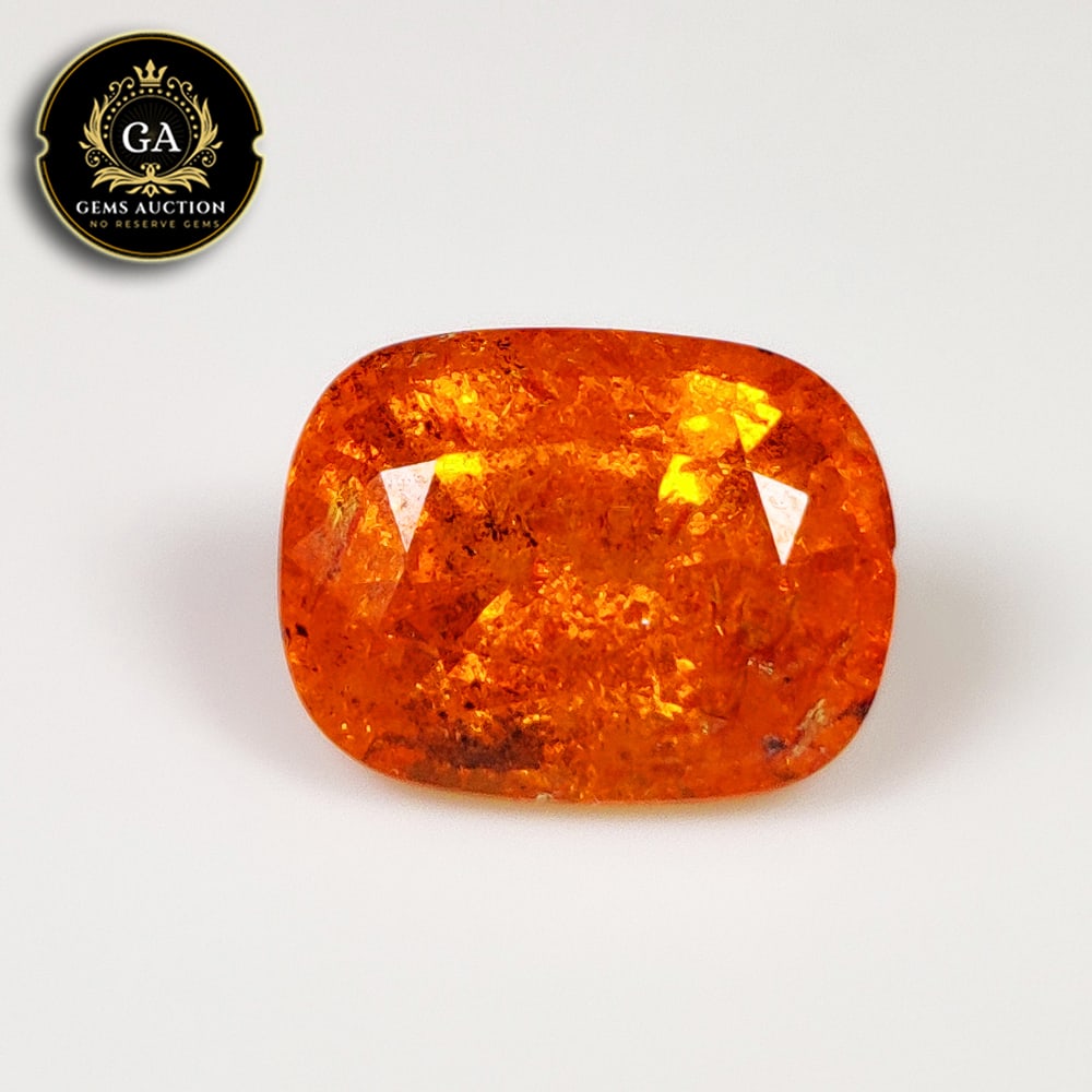 6.12 Ct Natural Fanta Orange Spessarite Garnet Cushion Cut: Weight - 6.12 Ct / Size - 12.00 x 9.00 x 6.40 mm / Shape - Cushion Cut / Clarity - SI / Origin - Madagascar / Treatment - None