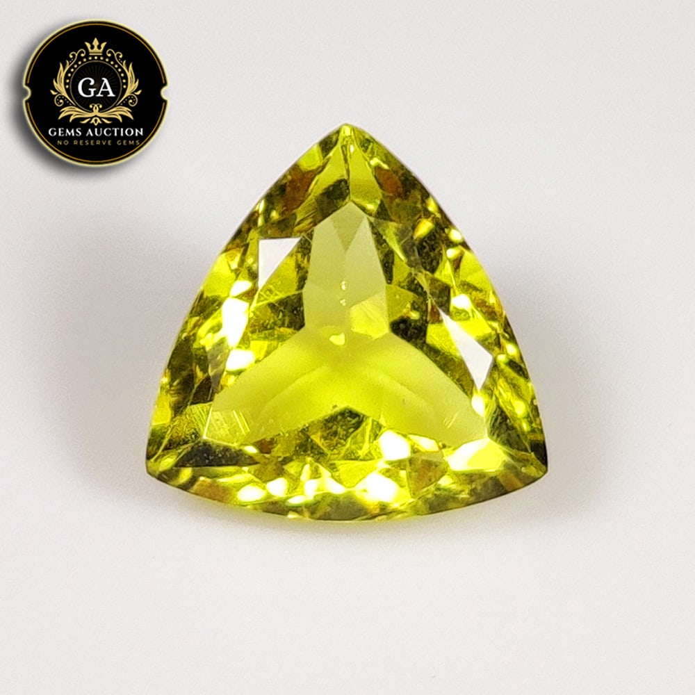3.35 Ct Natural Lemon Quartz Trillion Cut: Weight - 3.35 Ct / Size - 10.70 x 10.50 x 6.20 mm / Top Quality Luster / Excellent Trillion Cut / Origin - Brazil / Treatment - None
