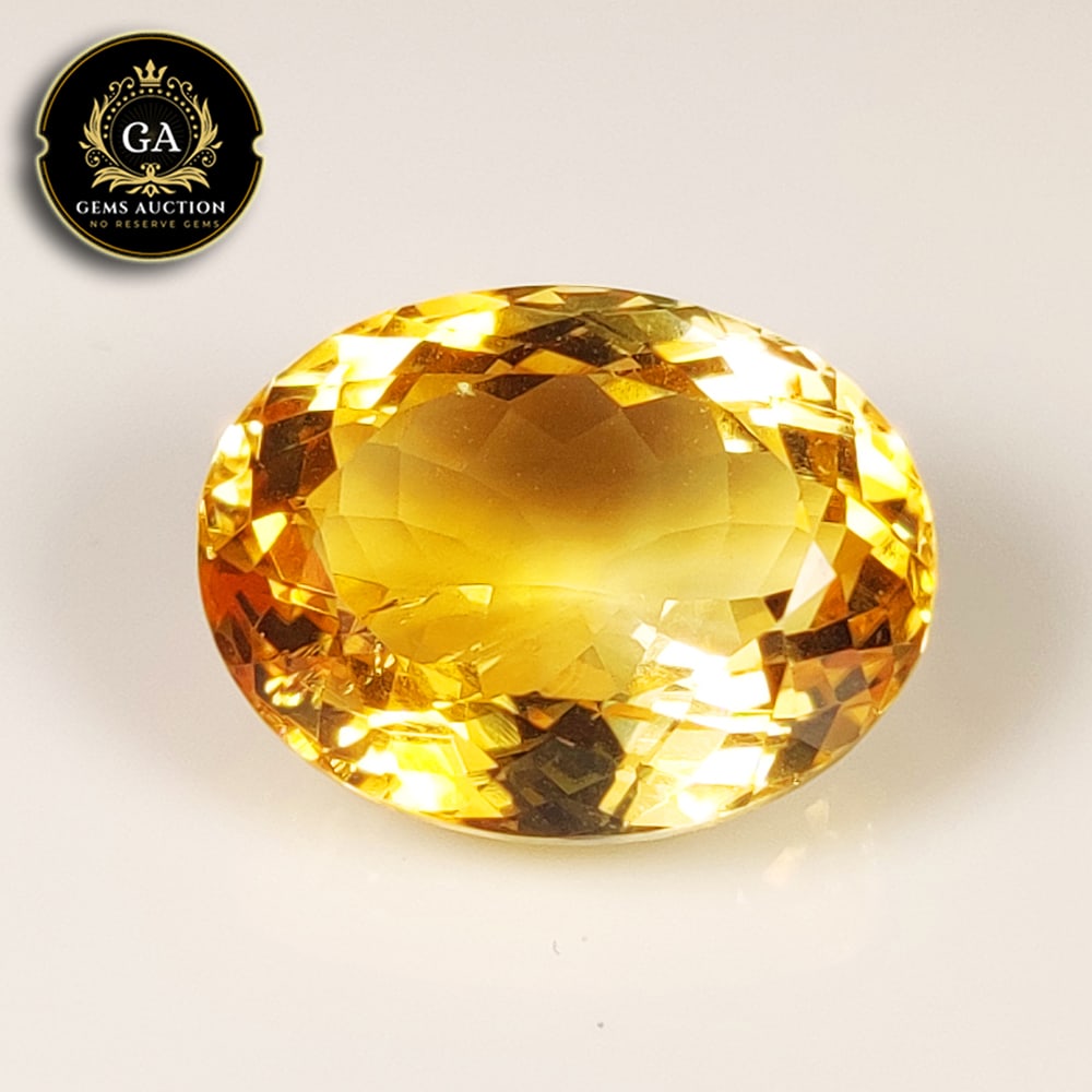 14.11 Ct Natural Citrine Oval Cut: Weight - 14.11 Ct / Size - 17.90 x 14.00 x 9.40 mm / Shape - Oval Cut / Color - Yellow / Clarity - VVS / Origin - Brazil / Treatment - None