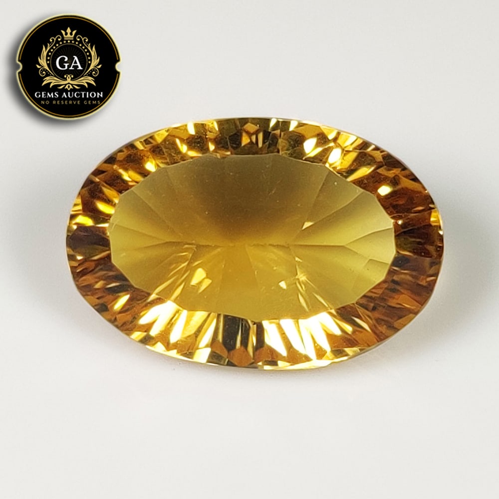 11.26 Ct Natural Citrine Oval Cut: Weight - 11.26 Ct / Size - 19.00 x 12.70 x 8.00 mm / Shape - Oval Cut / Color - Yellow / Clarity - VVS / Origin - Brazil / Treatment - None