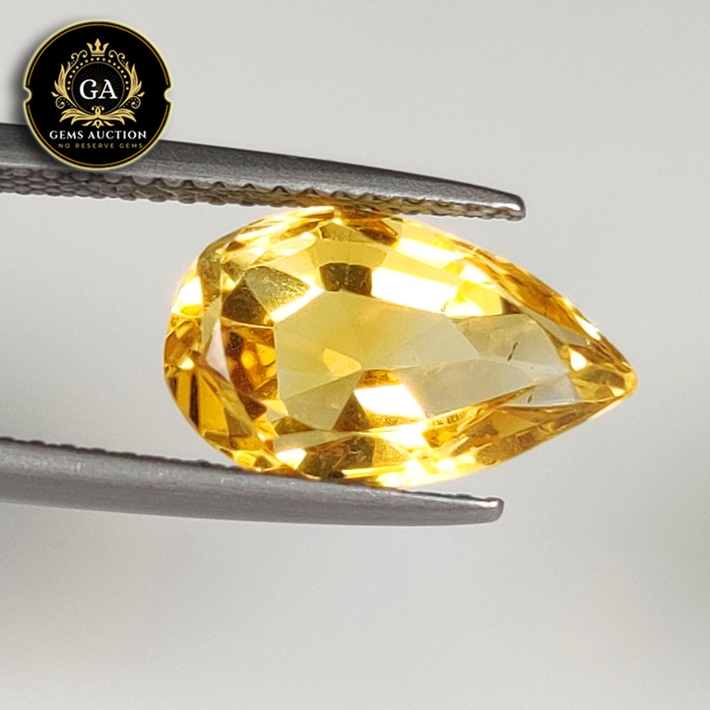 4.11 Ct Natural Citrine Pear Cut: Weight - 4.11 Ct / Size - 13.50 x 8.30 x 6.50 mm / Shape - Pear Cut / Color - Yellow / Clarity - VVS / Origin - Brazil / Treatment - None