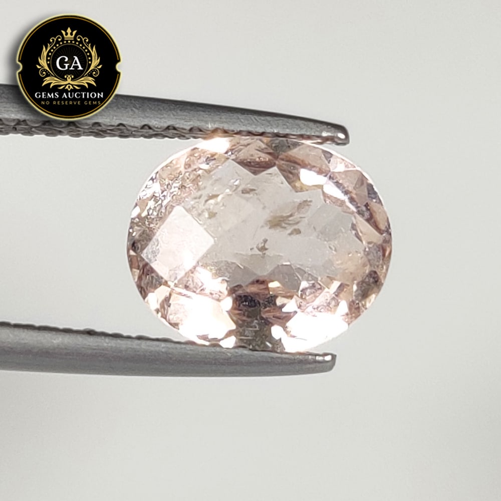 1.56 Ct Natural Peach Pink Morganite Oval Cut: Weight - 1.56 Ct / Size - 9.20 x 7.50 x 4.30 mm / Shape - Oval Cut / Color - Light Pink / Clarity - VVS / Origin - Mozambique / Treatment - None