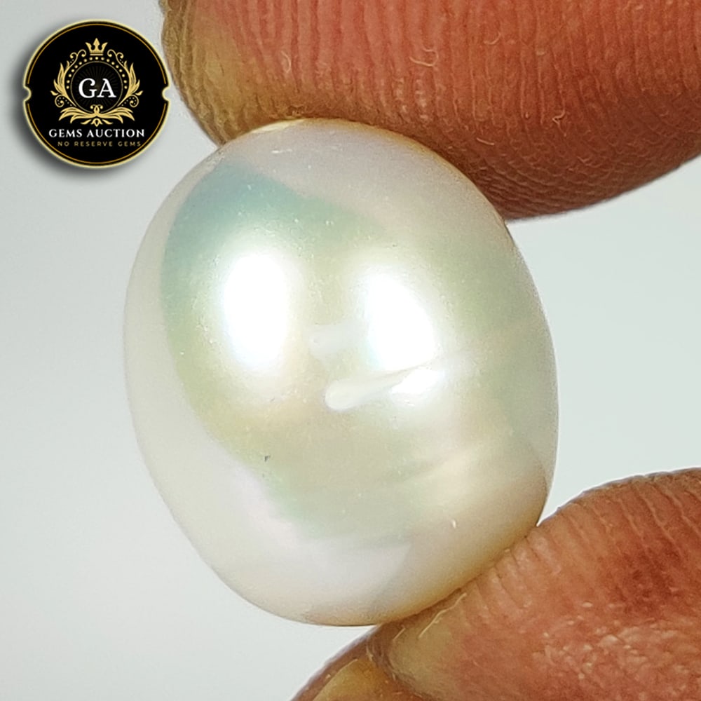 7.44 Ct Natural Fresh Water Pearl Egg Shaped Beads: Weight - 7.44 Ct / Size - 10.00 x 8.80 x 7.20 mm / Shape - Drilled Dumble Beads / Color - White / Clarity - OPaque / Origin - India / Treatment - None