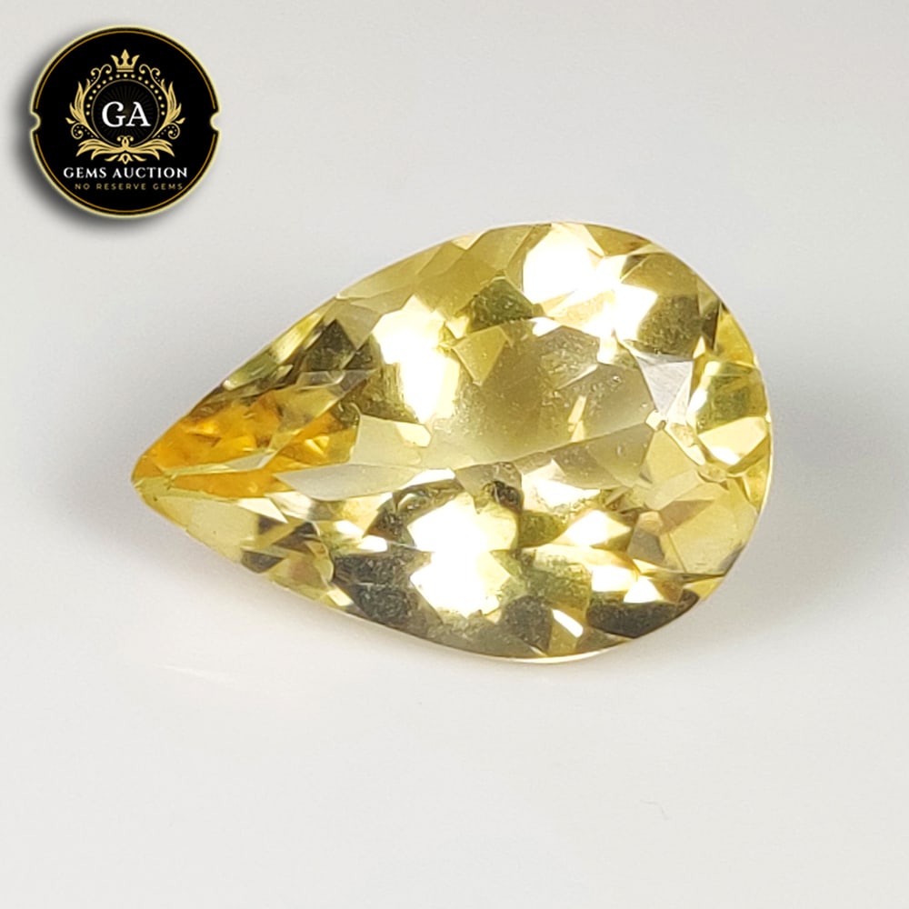 5.07 Ct Natural Citrine Pear Cut: Weight - 5.07 Ct / Size - 14.90 x 10.30 x 7.00 mm / Shape - Pear Cut / Color - Yellow / Clarity - VVS / Origin - Brazil / Treatment - None