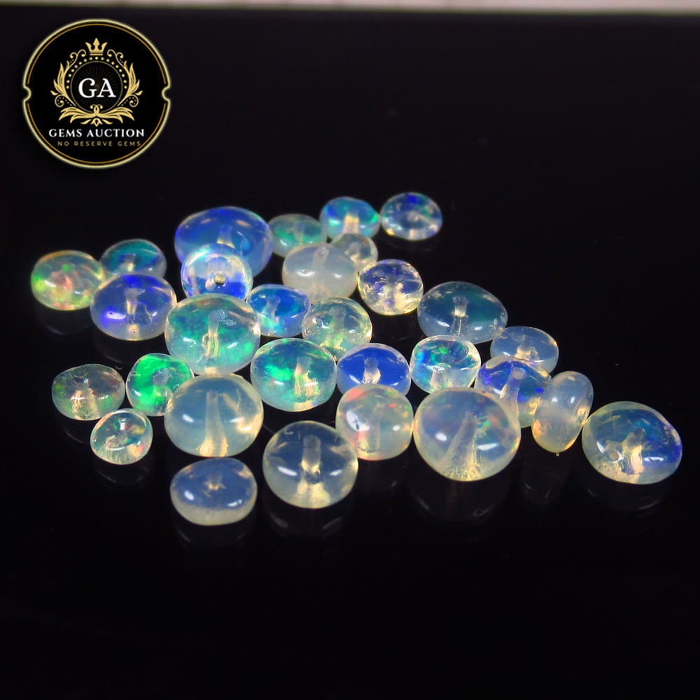 6.28 Ct Natural Drilled Multi-color Opal Good Fire Round Beads: Weight - 6.28 Ct / Size - 3.00 - 5.50 mm / 26 Pc's / Shape -Round Beads / Color - Multicolor / Clarity - Transparent / Origin - Ethiopia / Treatment - None