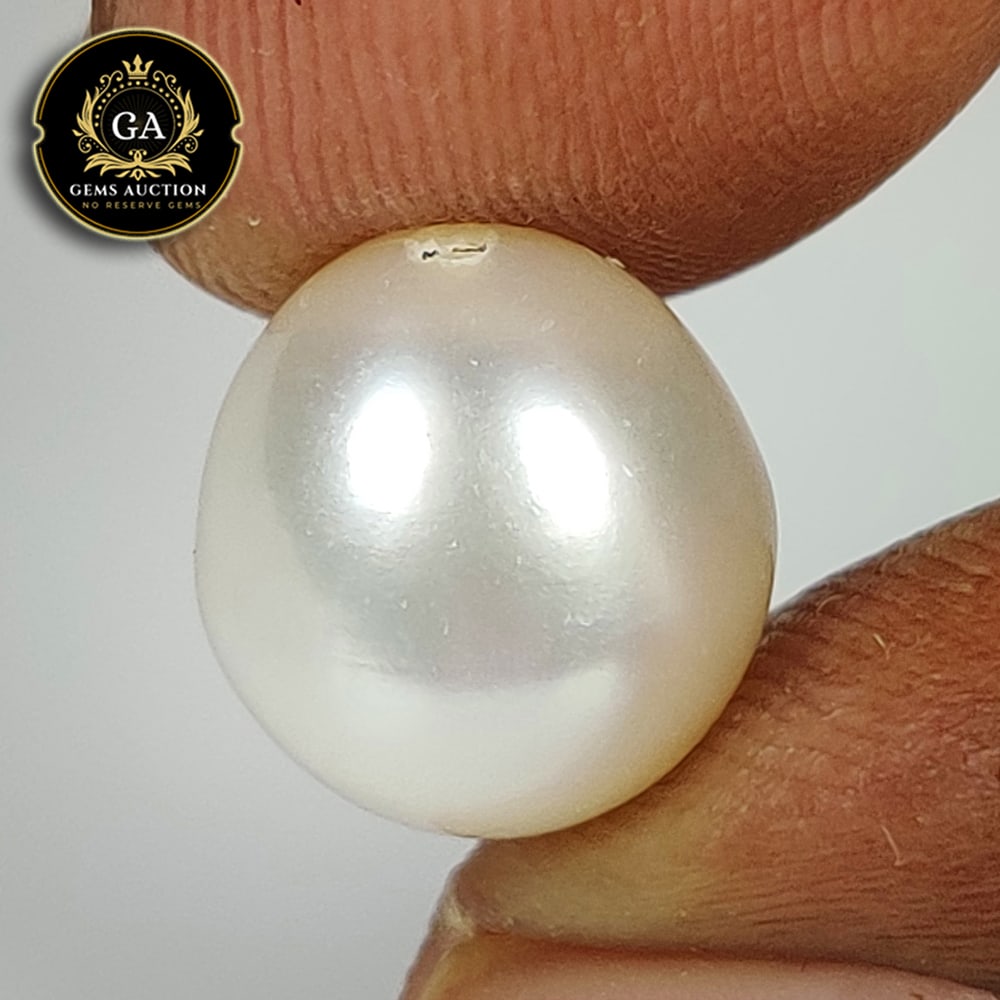 6.76 Ct Natural Fresh Water Pearl Egg Shaped Beads: Weight - 6.76 Ct / Size - 10.00 x 9.60 x 9.60 mm / Shape - Drilled Dumble Beads / Color - White / Clarity - OPaque / Origin - India / Treatment - None