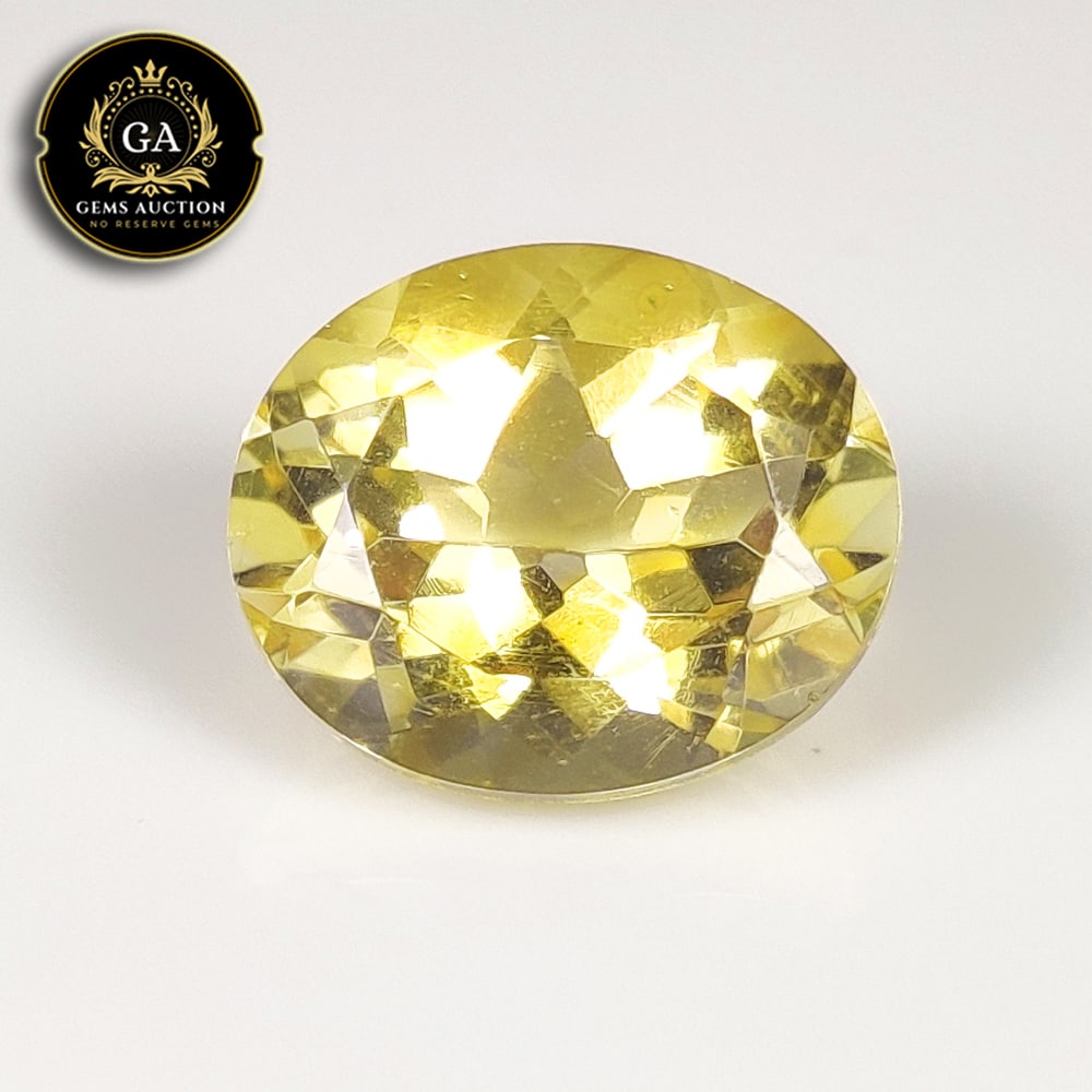 4.85 Ct Natural Citrine Oval Cut: Weight - 4.85 Ct / Size - 12.10 x 10.10 x 7.20 mm / Shape - Oval Cut / Color - Yellow / Clarity - VVS / Origin - Brazil / Treatment - None
