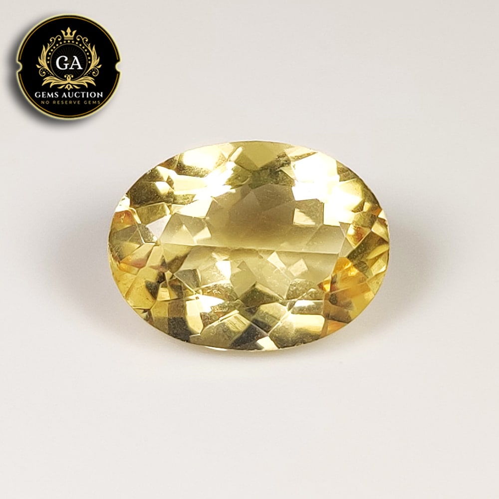 7.63 Ct Natural Citrine Oval Cut: Weight - 7.63 Ct / Size - 16.00 x 11.90 x 7.40 mm / Shape - Oval Cut / Color - Yellow / Clarity - VVS / Origin - Brazil / Treatment - None