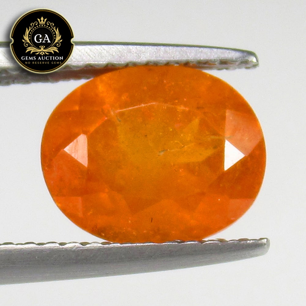 2.95 Ct Natural Fanta Orange Spessarite Garnet Oval Cut: Weight - 2.95 Ct / Size - 9.50 x 7.80 x 5.00 mm / Shape - Oval Cut / Clarity - SI / Origin - Madagascar / Treatment - None