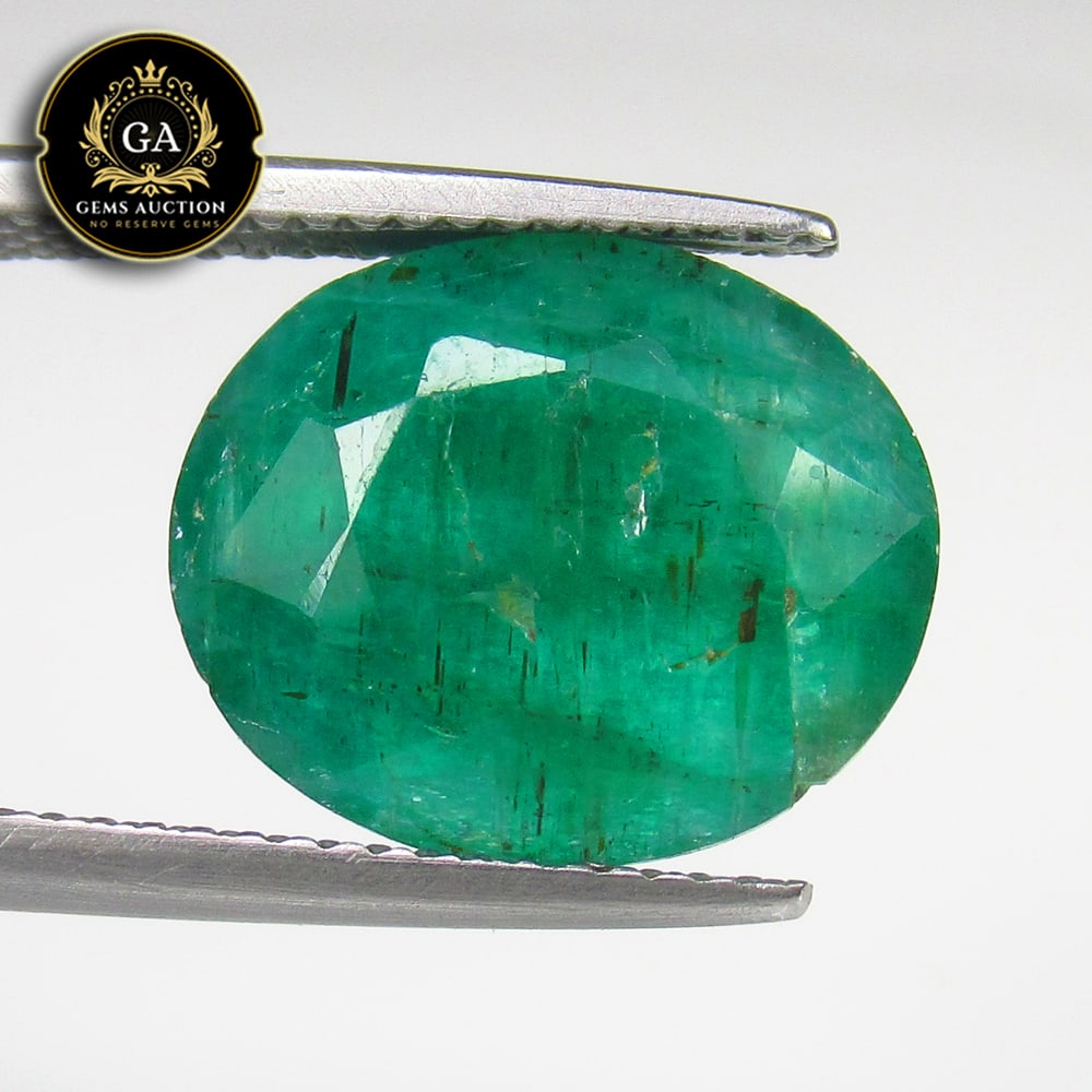 6.53 Ct Natural Green Emerald Oval Cut: Weight - 6.53 Ct / Size -13.50 x 11.30 x 6.00 mm / Shape - Oval Cut / Color - Green / Clarity - SI / Origin - Zambia / Treatment - Color Coated