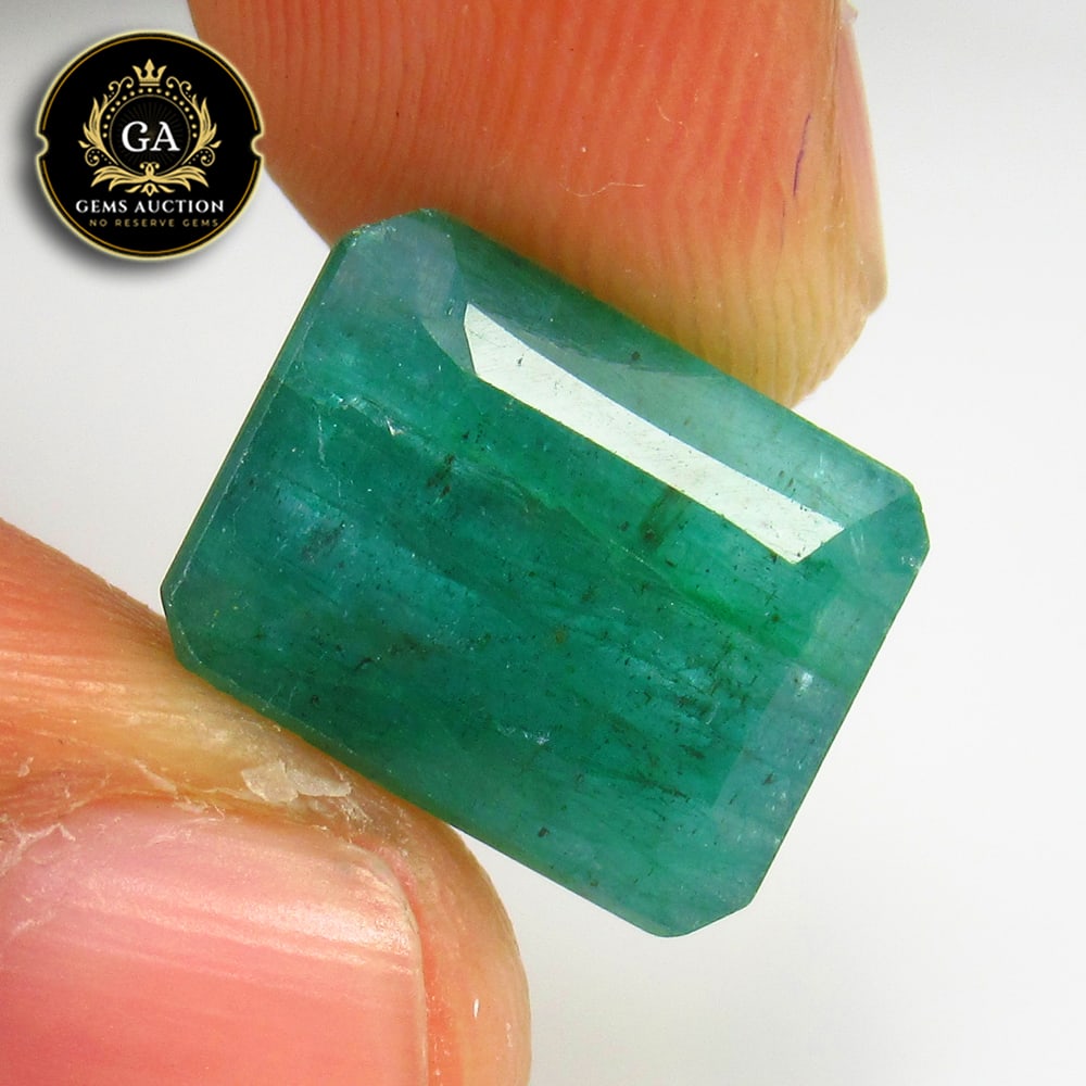 9.24 Ct Natural Green Emerald Octagon Cut: Weight - 9.24 Ct / Size -13.80 x 11.00 x 7.00 mm / Shape - Octagon Cut / Color - Green / Clarity - SI / Origin - Zambia / Treatment - Color Coated
