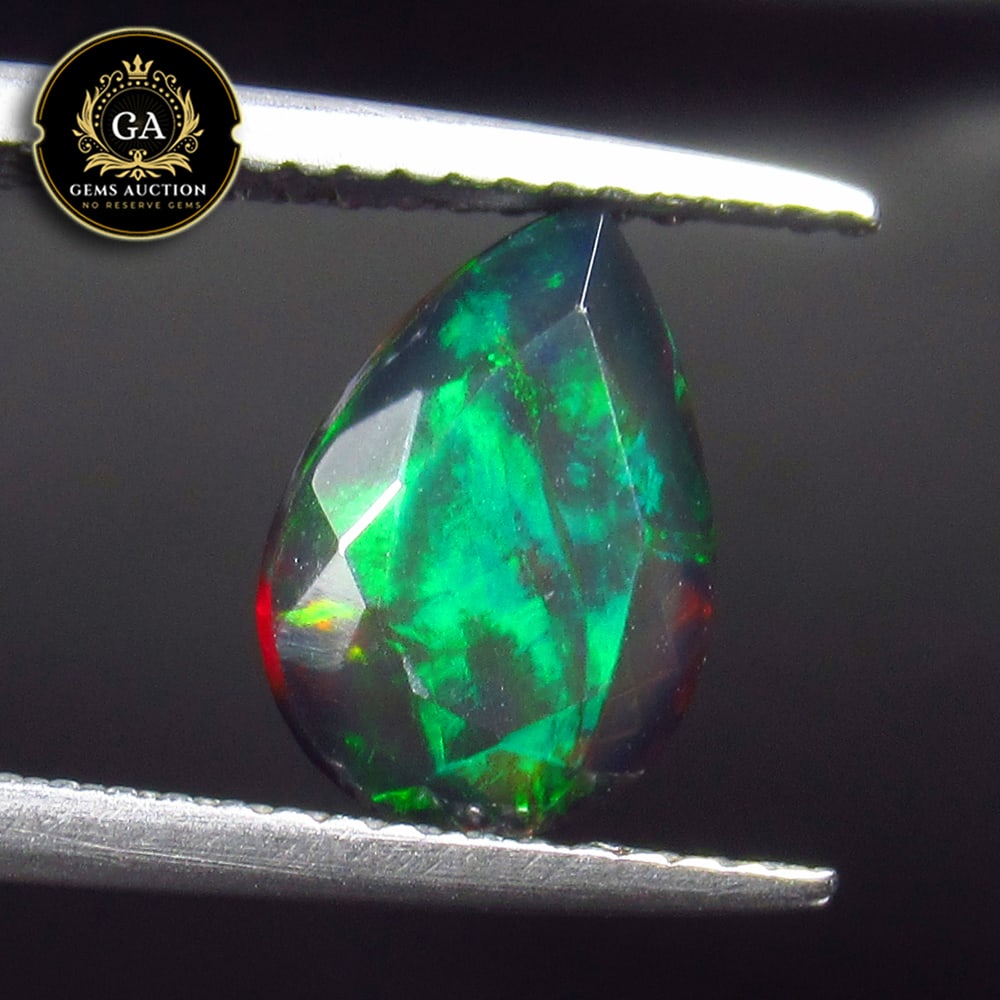 1.18 Ct Natural Black Faceted Fire Opal Pear Cut (1 of 2)