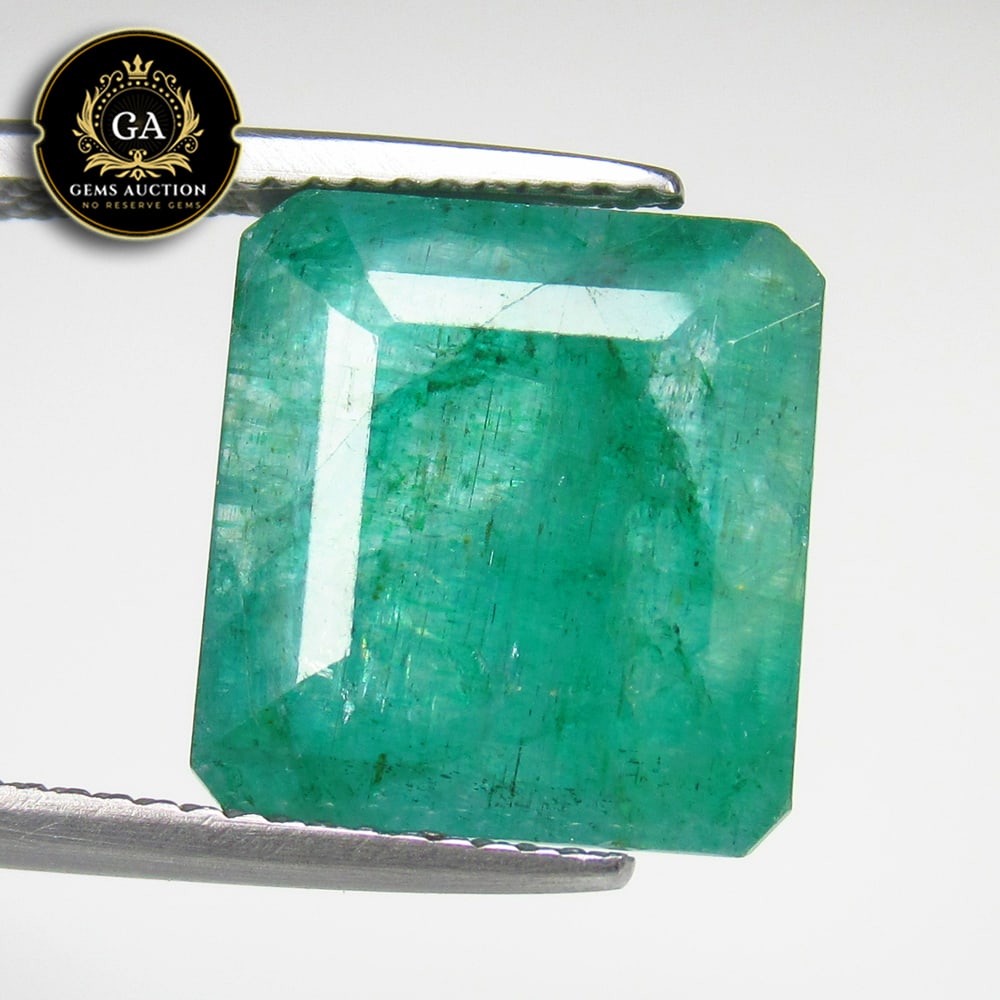 9.62 Ct Natural Green Emerald Octagon Cut: Weight - 9.62 Ct / Size -12.30 x 11.50 x 7.50mm / Shape - Octagon Cut / Color - Green / Clarity - SI / Origin - Zambia / Treatment - Color Coated