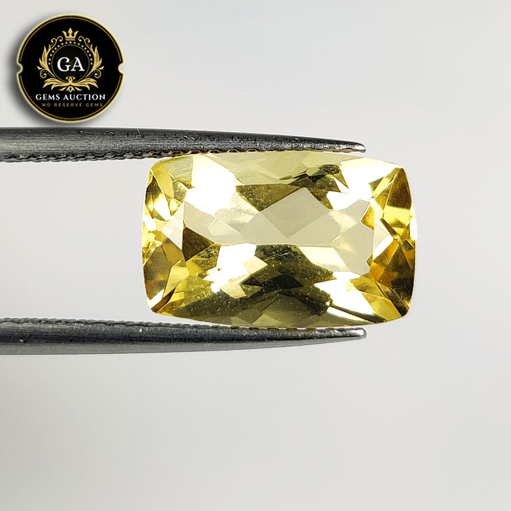 3.72 Ct Natural Citrine Cushion Cut: Weight - 3.72 Ct / Size - 12.20 x 8.00 x 6.00 mm / Shape - Cushion Cut / Color - Yellow / Clarity - VVS / Origin - Brazil / Treatment - None
