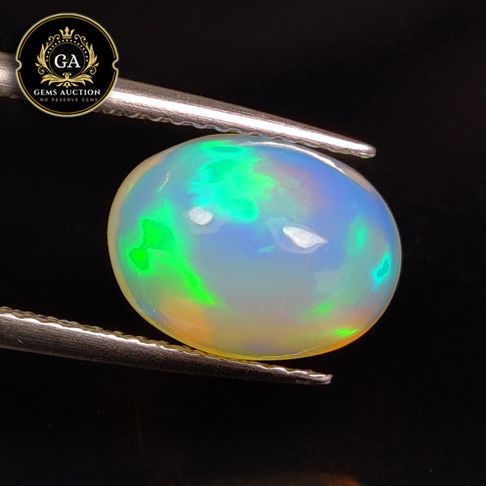 2.66 Ct Natural Multi-Color Welo Fire Opal Oval Cab (1 of 3)