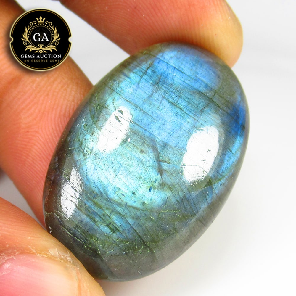 36.93 Ct Natural Blue Shaded Labradorite OVal Cab: Weight - 36.93 Ct / Size - 36.00 x 21.00 x 6.30 mm / Shape - Excellent Oval Cabochon / Clarity - Opaque / Origin - Africa / Treatment - None