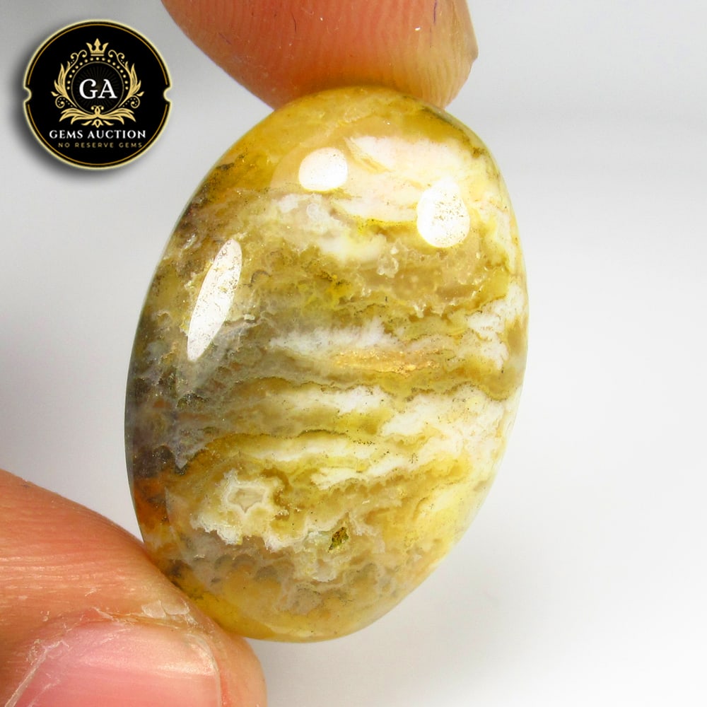 24.86 Ct Natural Yellow Jasper Oval Cab: Weight - 24.86 Ct / Size - 28.00 x 18.00 x 7.10 mm / Shape - Oval Cabochon / Clarity - Opaque / Origin - Brazil / Treatment - None