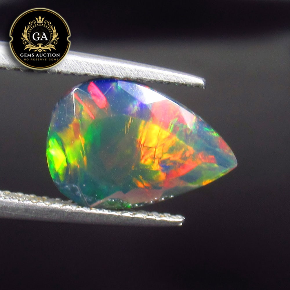 2.08 Ct Natural Black Faceted Fire Opal Pear Cut (1 of 3)