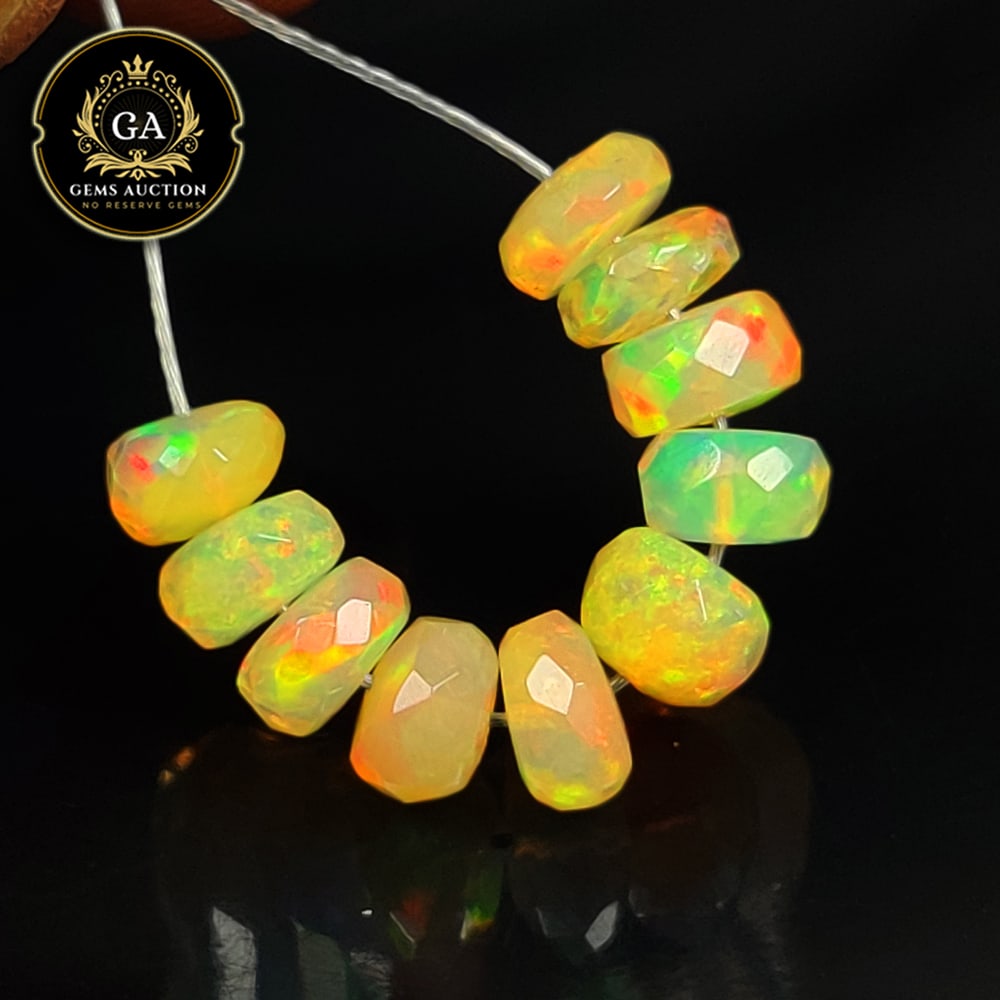 3.92 Ct Natural Drilled Multi-color Fire Opal Round Beads: Weight - 3.92 Ct / Size - 5.50 - 5.60 mm / Pieces - 10 No's / Shape -Round Beads / Color - Multicolor / Clarity - Transparent / Origin - Ethiopia / Treatment - None