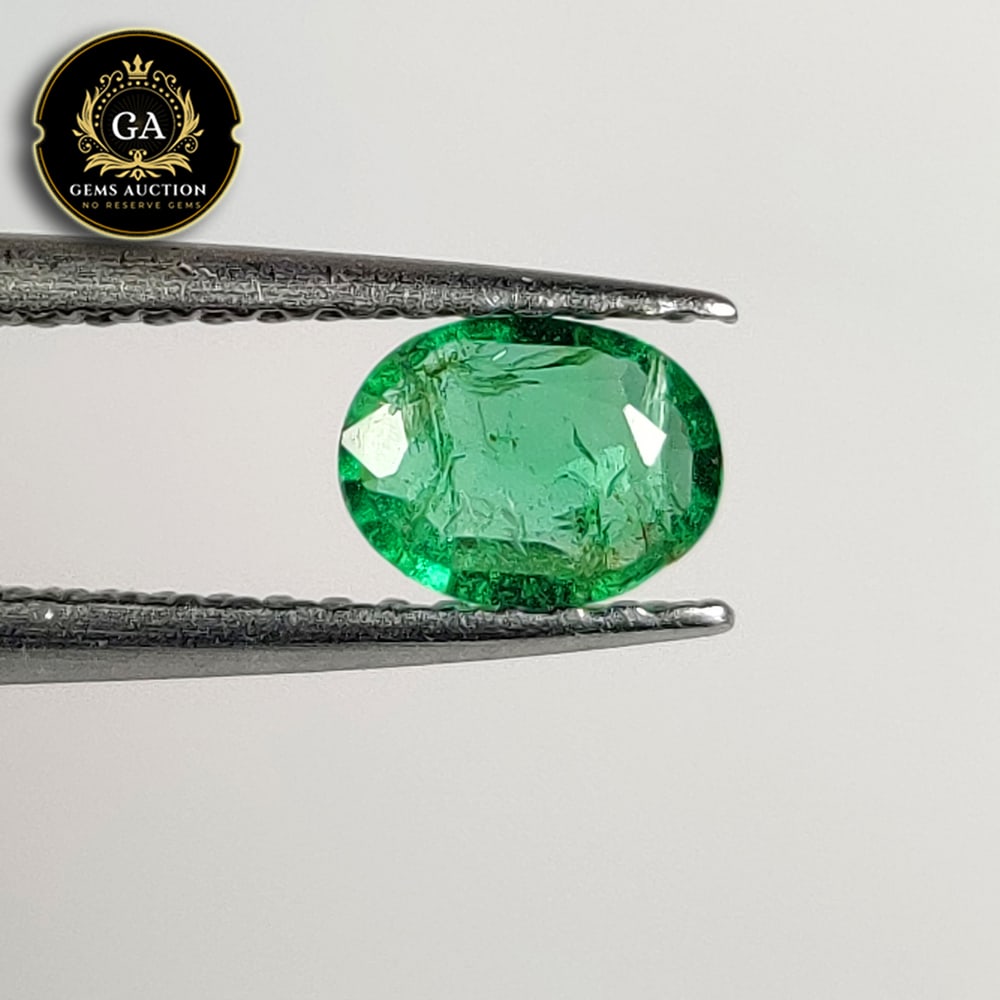 0.34 Ct Natural Zambian Emerald Oval Cut: Weight - 0.34 Ct / Size -5.70 x 4.40 x 2.00 mm / Shape - Oval Cut / Color - Green / Clarity - SI / Origin - Zambia / Treatment - Colorless Oil