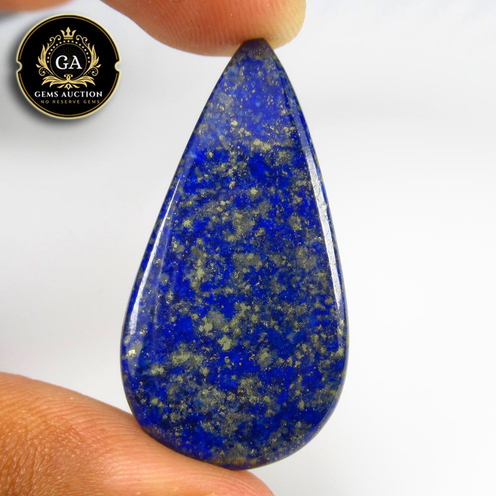 20.71 Ct Natural Blue Lapis Lazuli Pear Cab: Weight - 20.71 Ct / Size - 41.00 x 21.00 x 2.50 mm / Shape - Pear Cab / Clarity - Opaque / Origin - Ethiopia / Treatment - None
