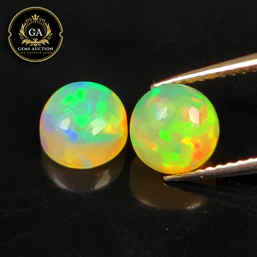 2.36 Ct Natural Multi-Color Welo Flash Fire Opal Round Cab Pair (1 of 3)