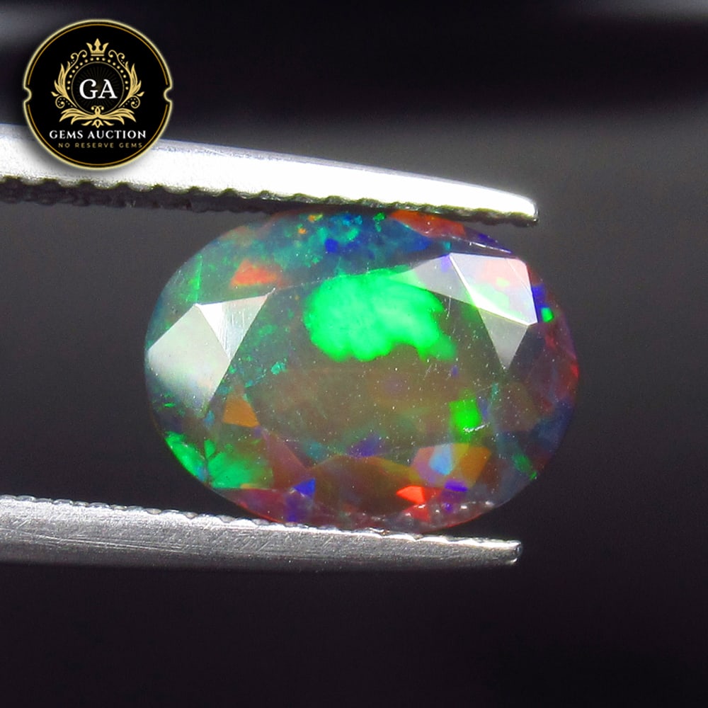 1.90 Ct Natural Black Faceted Fire Opal Oval Cut (1 of 2)