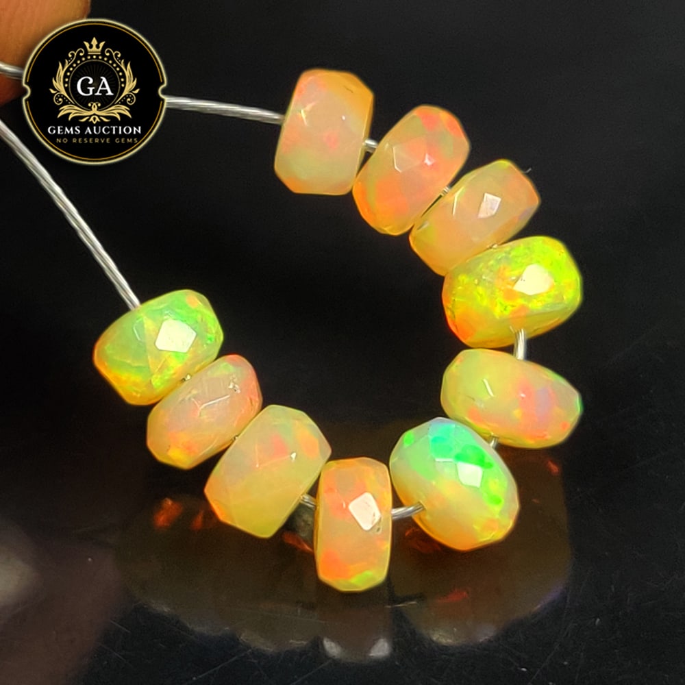4.05 Ct Natural Drilled Multi-color Fire Opal Round Beads: Weight - 4.05 Ct / Size - 5.30 - 5.60 mm / Pieces - 10 No's / Shape -Round Beads / Color - Multicolor / Clarity - Transparent / Origin - Ethiopia / Treatment - None